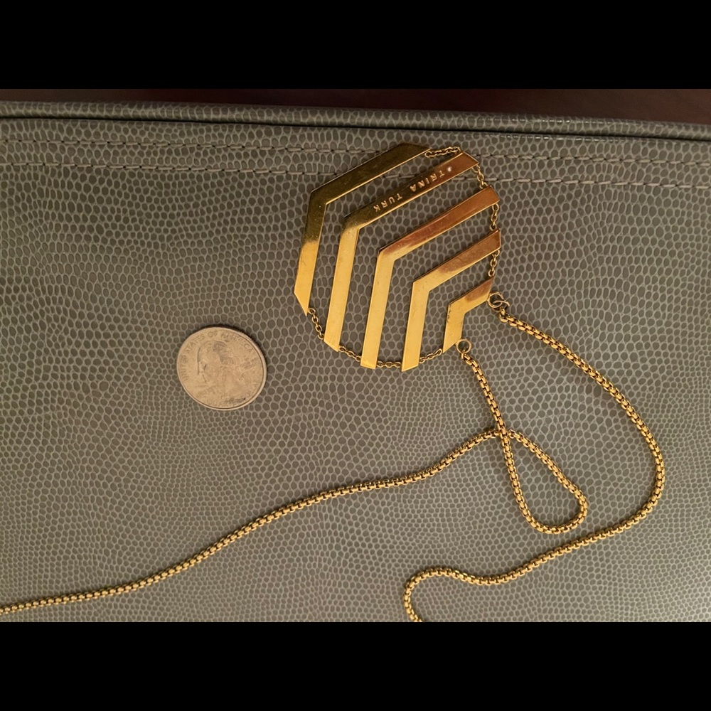 Trina Turk golden geo necklace about 30” drop.